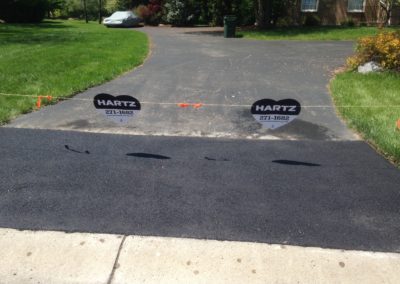 Hartz residential driveway sealcoating, crack filling and patching